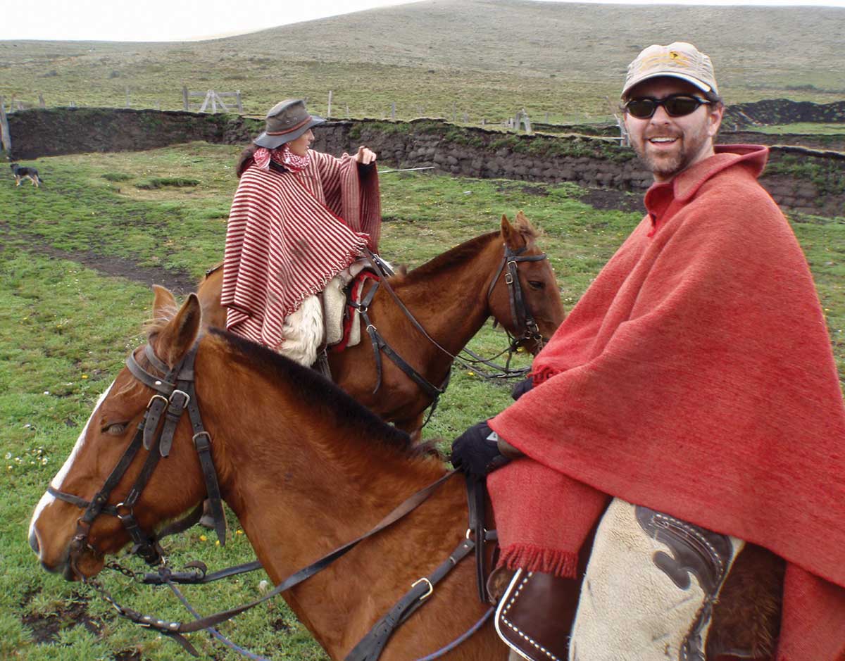 Morgan prepares for a horseback ride in the foothills of Ecuador’s Cotopaxi National Park in 1999.
