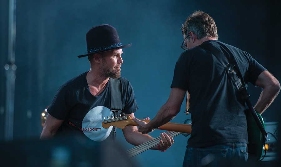 Pearl Jam bass player Jeff Ament (left) and rhythm guitarist Stone Gossard fill Washington-Grizzly Stadium with rock on Aug. 13. 
