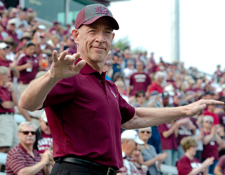Simmons directs the UM Marching Band during a Griz football game in 2012. (Photo by Todd Goodrich)