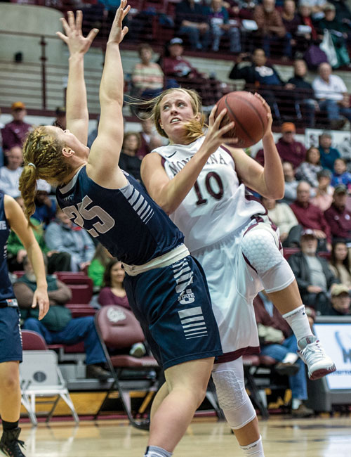 Kayleigh Valley shoots over a Utah State defender
