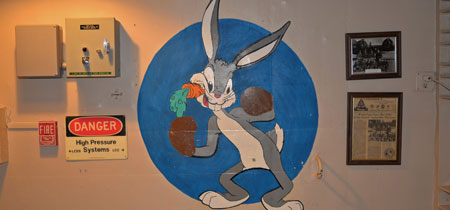 A Bugs Bunny mural is painted on a wall inside a bunker below a U.S. Air Force base. “The painting is an homage to a World War II bomber crew,” says Jeff MacDonald, a CIRE investigator pursuing his doctorate at UM.