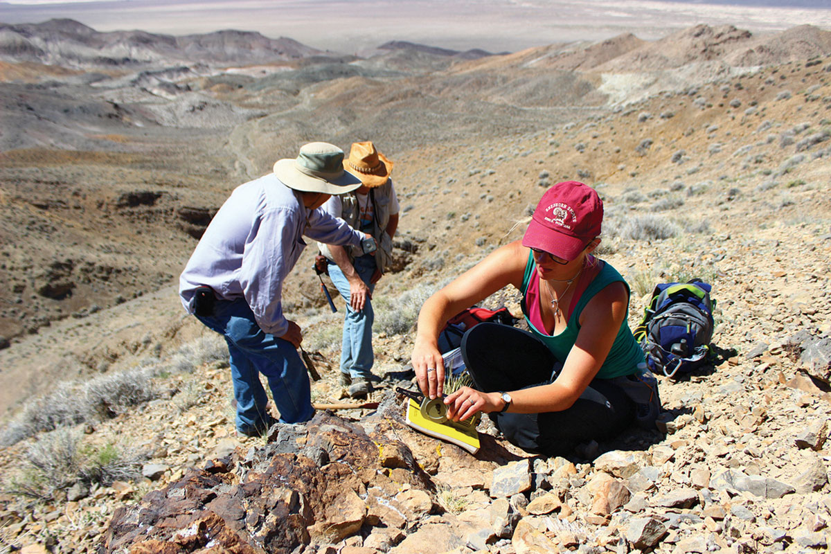 A University of Montana field team measures rocks at New York Canyon, Nevada. (Photo courtesy of Montana Hodges)