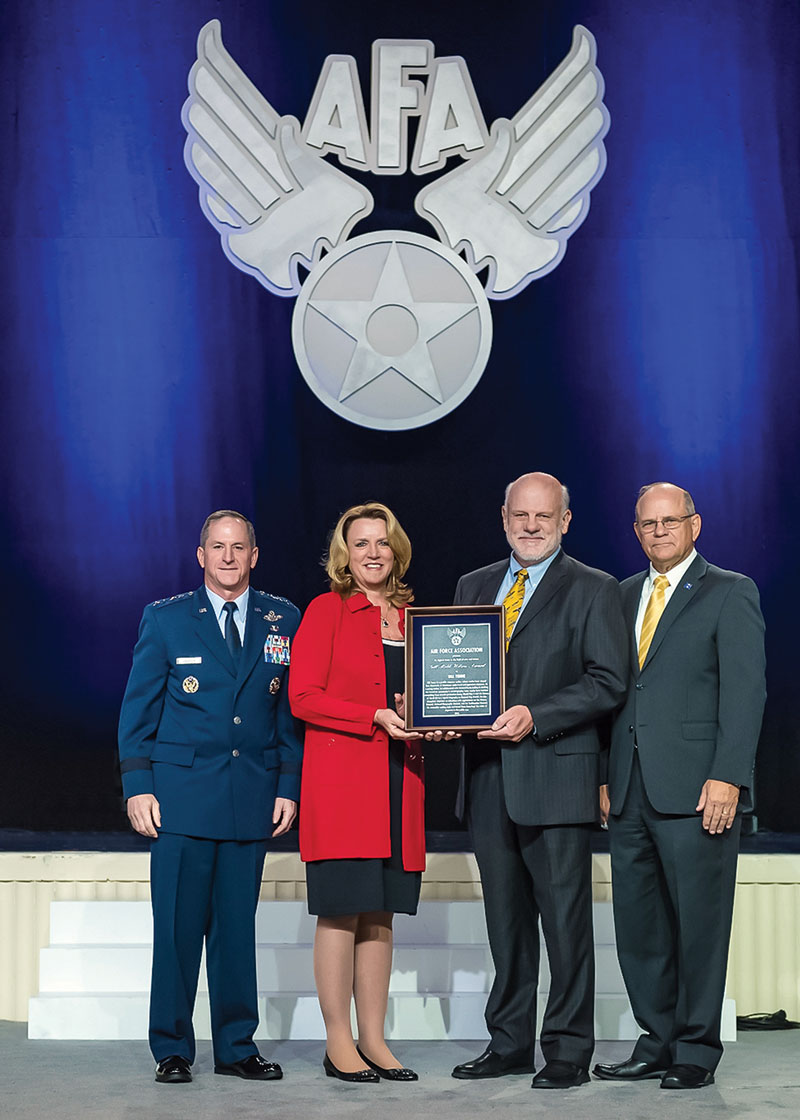 Bill Yenne, third from left, receives the Air Force Association’s Gill Robb Wilson Award for the “most outstanding contribution in the field of arts and letters.
