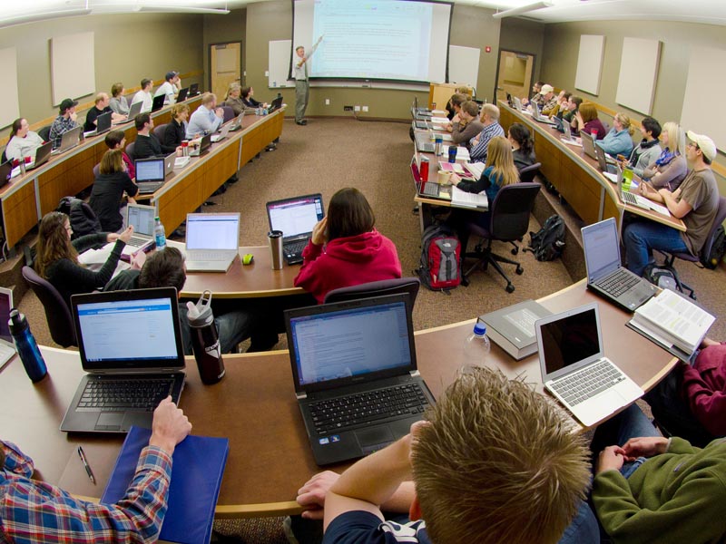 Students engaged in a Alexander Blewett III School of Law class.
