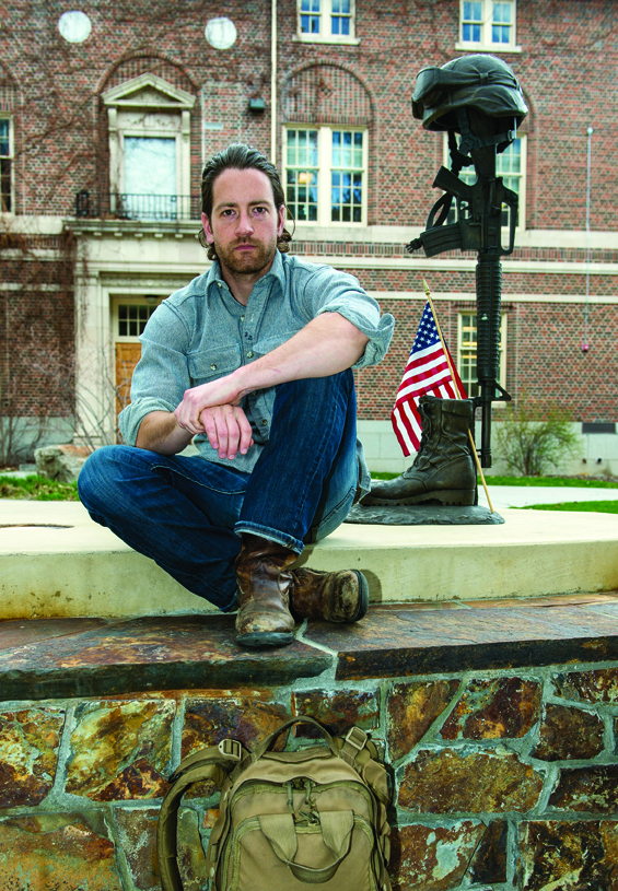 Staff Sergeant Adam McCaw, now a student at UM, poses at the Fallen Soldier Memorial on campus. McCaw used his Pashto training at UM’s Defense Critical Language and Culture Program while serving in Afghanistan to communicate with locals and help save lives.