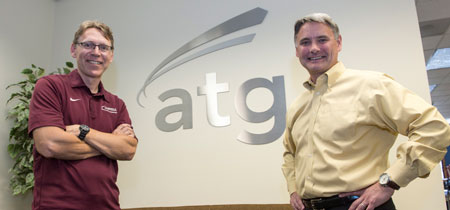UM Professor David Firth, left, and Tom Stergios, vice president of Advanced Technology Group, have created a unique partnership that helps keep talented UM graduates in Montana working high-paying, high-tech jobs.