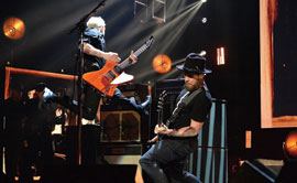 Pearl Jam bassist Jeff Ament and guitarist Mike McCready rock out at the Rock and Roll Hall of Fame induction ceremony at the Barclays Center in Brooklyn, New York, in April. (Photo by Getty Images)