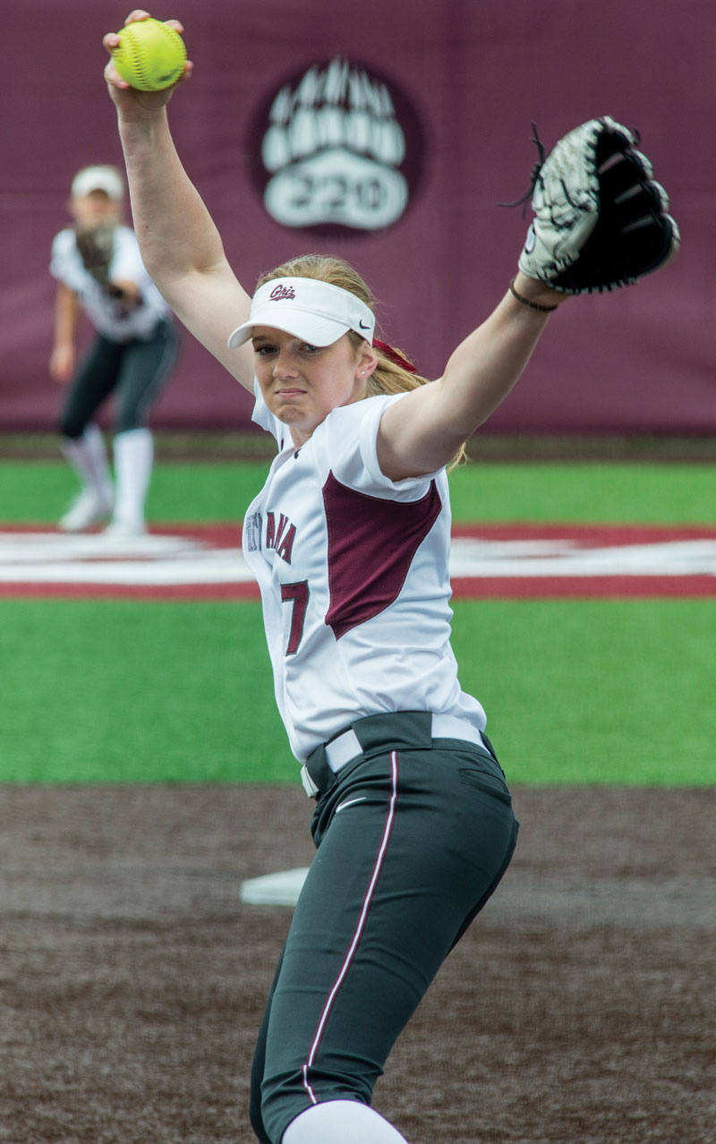 Michaela Hood, a freshman for the Montana Grizzlies softball team, fires a pitch at an April game against Idaho State University.