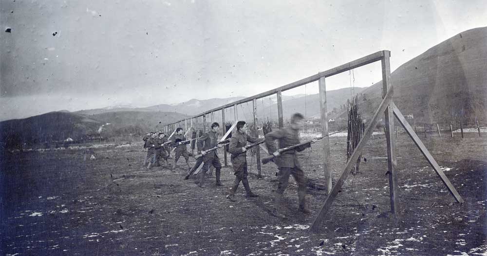 World War I-era student cadets conduct bayonet training on the UM Oval. 