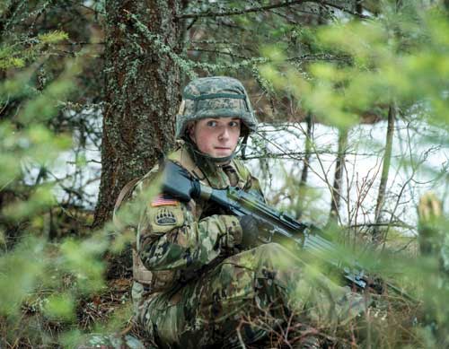 UM ROTC Cadet Chris Blaser, a 19-year-old sophomore from Boise, Idaho, awaits orders as his unit prepares to assault an objective in the Rattlesnake National Recreation Area and Wilderness during a weekly leadership lab.