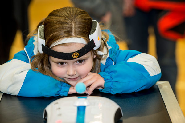 Juliauna Heiser, age five, deeply concentrates while participating in a game of Mindflex Duel at spectrUM’s Family Science night in Lincoln, Mont., in november.