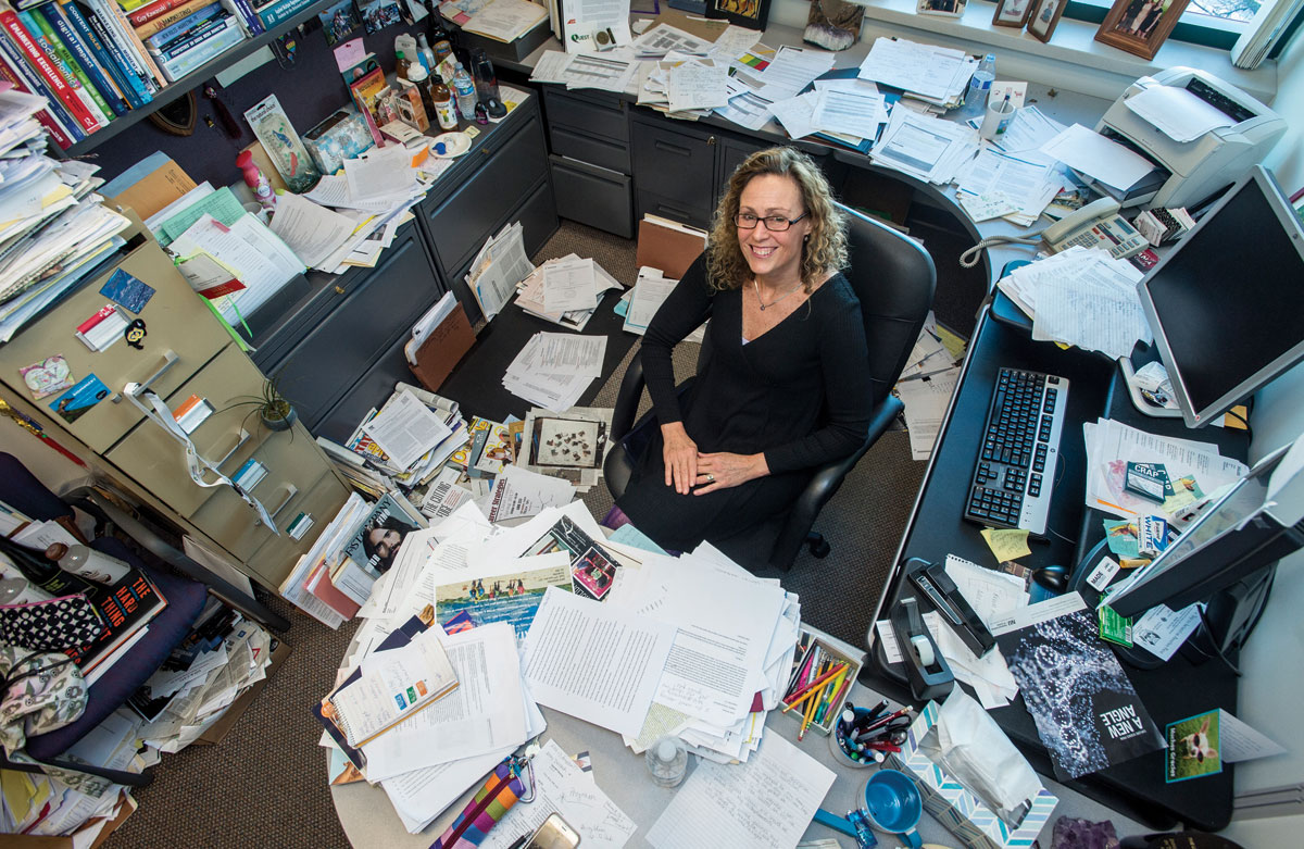 UM Regents Professor of Marketing Jakki Mohr sits in her office on the third floor of the Gallagher Business Building. Mohr has taught at UM since 1997.