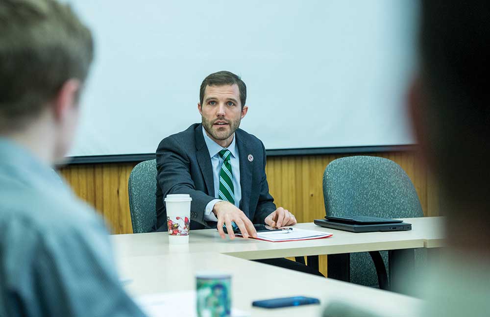 Shown here at a UM Cabinet meeting, Bodnar is prepping a shared vision for UM that will include where the University needs to go and what it needs to do to get there.